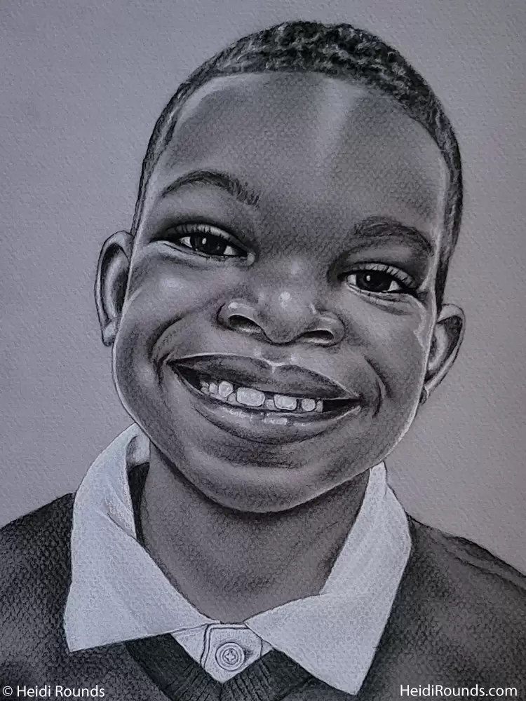 Commissioned child portrait drawing, charcoal/pastel on toned paper, a little boy in a collared shirt smiling, Heidi Rounds