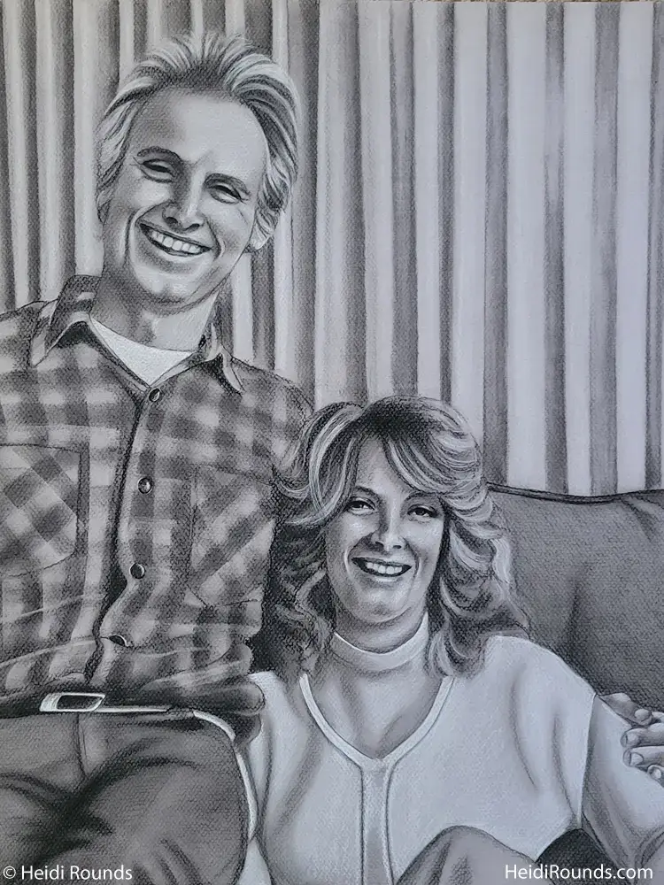 "Commissioned Portrait Drawing of a Couple Sitting Together" 16"x20" charcoal/pastel portrait drawing on toned paper by Heidi Rounds. A happy couple sitting together on a couch in front of a curtain.